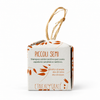 Confezione di Piccoli Semi, shampoo e balsamo solido 2 in 1, fotografata frontalmente su sfondo bianco.