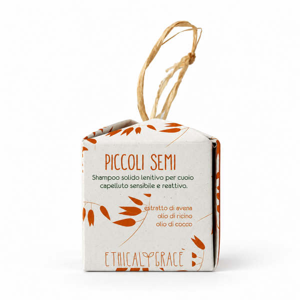Confezione di Piccoli Semi, shampoo e balsamo solido 2 in 1, fotografata frontalmente su sfondo bianco.